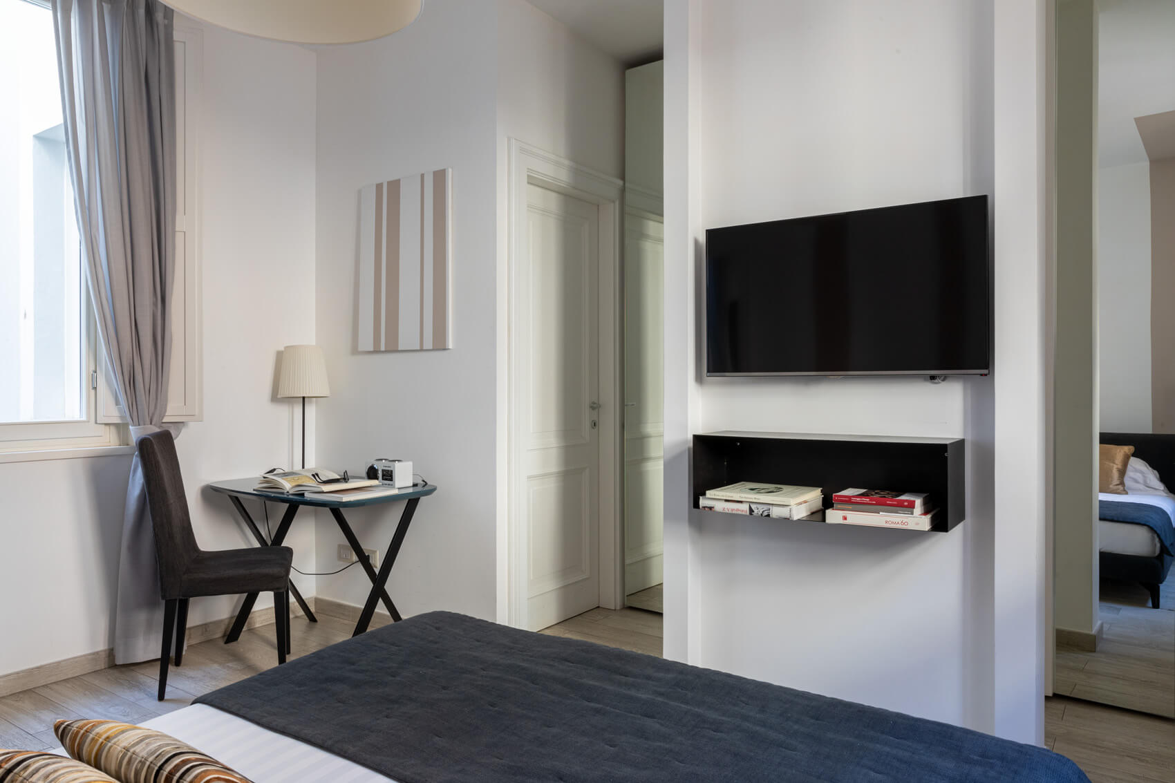 Camera da letto dell’Appartamento Parbleu a Now Apartments Roma centro